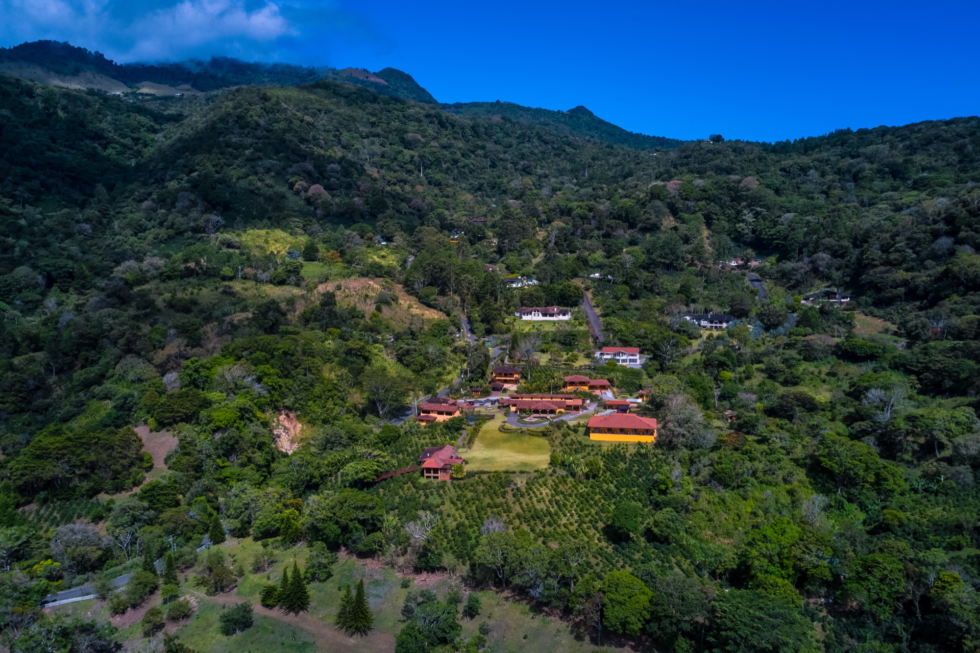 Aerial view of Los Establos among the green hills of Boquete, Panama
